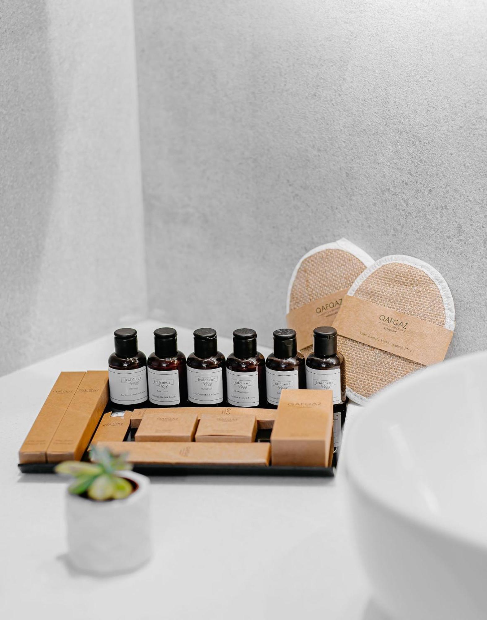 Qafqaz Riverside Hotel Gabala Eksteriør bilde A selection of amenities by the brand